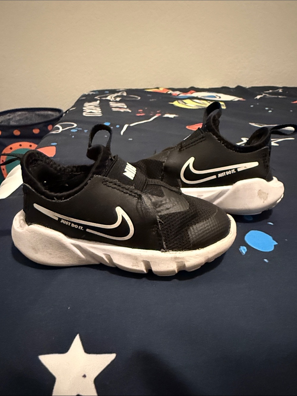 Nike Kids Black and White Slip-On Sneakers with Swoosh